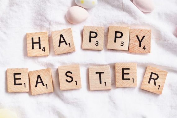 Photo of Scrabble letters reading "Happy Easter."