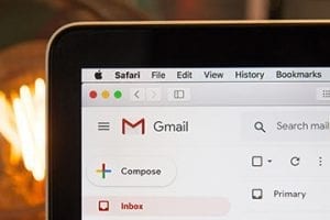 Image of a smartphone screen with a prominent Gmail icon