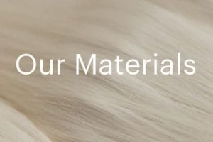 Screenshot from Everlane's website with text "Our Materials" behind an image of cotton