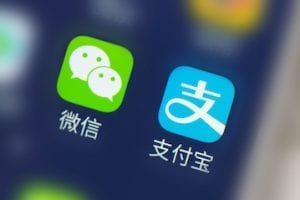 Mobile phone screen with WeChat and Alipay apps