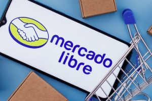 Photo of a smartphone with Mercado Libre logo on the screen