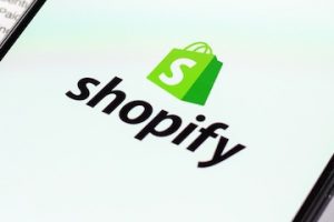 Screenshot of a Shopify logo on a smartphone screen