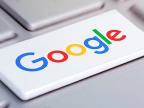 Google logo on the "return" key of a computer keyboard