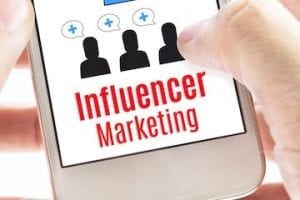 Image of a smartphone screen showing the text "Influencer marketing"