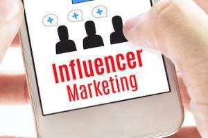 Image of a smartphone screen with the words "Influencer Marketing"