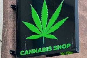 Photo of a retail sign reading "Cannabis Shop"