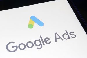 Google Ads logo on a smartphone screen.